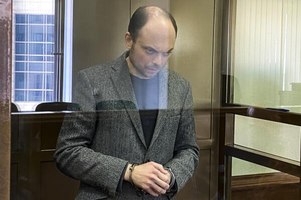 In this handout photo released by the Moscow City Court, Russian opposition activist Vladimir Kara-Murza stands in a class cage in a courtroom at the Moscow City Court in Moscow, on April 17, 2023. The 25-year treason sentence imposed on prominent Russian opposition figure Vladimir Kara-Murza on Monday was a particularly severe show of authorities' intensifying intolerance of criticism of the war in Ukraine and other dissenting opinions. (The Moscow City Court via AP)
