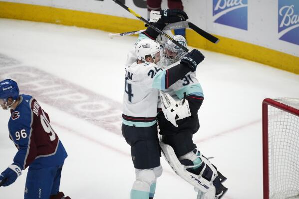 Seattle Kraken goaltender Philipp Grubauer (31) blocks the puck against the  Colorado Avalanche during the third period of Game 4 of an NHL hockey  Stanley Cup first-round playoff series Monday, April 24