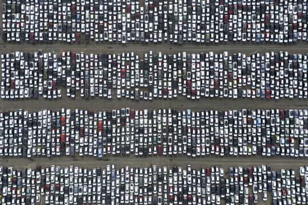 Cars are parked at Port of Tilbury, England, Wednesday, Feb. 5, 2025. (AP Photo, File)