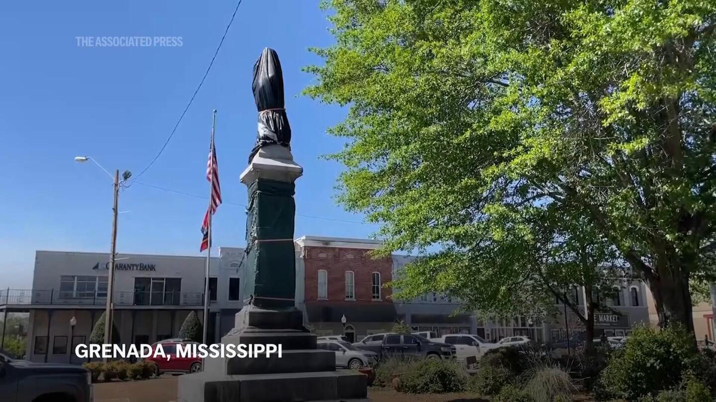 A Confederate monument is moved in Mississippi, after four years of being covered by tarps