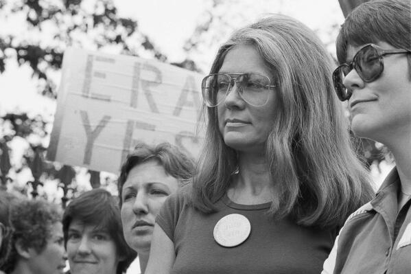 FILE - Gloria Steinem of the National Organization for Women attends an Equal Rights Amendment rally outside the White House on July 4, 1981, in Washington. Reproductive freedom was not the only demand of second-wave feminism, as the women's movement of the '60s and '70s is known, but it was surely one of the most galvanizing issues, along with workplace equality. (ĢӰԺ Photo/Scott Applewhite, File)