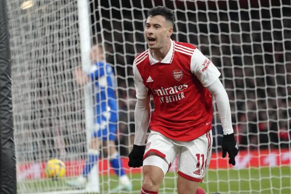 Arsenal's Gabriel Martinelli celebrates after scoring his side's fourth goal during the English Premier League soccer match between Arsenal and Everton at the Emirates stadium in London, Wednesday, March 1, 2023. (AP Photo/Kirsty Wigglesworth)