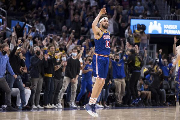 Golden State Warriors guard Klay Thompson (11) reacts after hitting a 3-point shot against the Los Angeles Lakers late in the second half of an NBA basketball game in San Francisco, Saturday, Feb. 12, 2022. The Warriors won 117-115. (AP Photo/John Hefti)