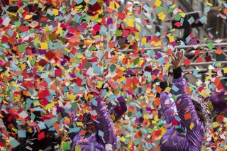 Confetti is released during a confetti test ahead of New Year's Eve in Times Square, Friday, Dec. 29, 2023, in New York. (AP Photo/Yuki Iwamura)