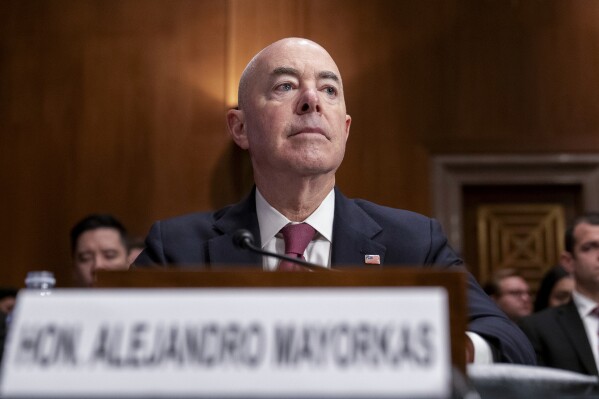 FILE - Secretary of Homeland Security Alejandro Mayorkas testifies during a Senate Homeland Security and Governmental Affairs Committee hearing on threats to the homeland, Oct. 31, 2023, on Capitol Hill in Washington. As Republicans in the House of Representatives threaten to make Mayorkas the first Cabinet official impeached in nearly 150 years, Mayorkas says, in a wide-ranging interview with The Associated Press, he is “totally focused on the work" that his agency of 260,000 people conducts and not distracted by the politics of impeachment. (AP Photo/Stephanie Scarbrough, File)