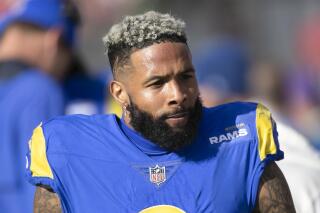 FILE - Los Angeles Rams wide receiver Odell Beckham Jr. walks on the sideline during a NFL divisional playoff football game against the Tampa Bay Buccaneers on Jan. 23, 2022, in Tampa, Fla. The Baltimore Ravens agreed to a one-year contract with Beckham Jr., boosting their flagging wide receiver corps while the team's quarterback situation remains far from certain. The Ravens announced the move Sunday, April 9, 2023. (AP Photo/Alex Menendez, File)