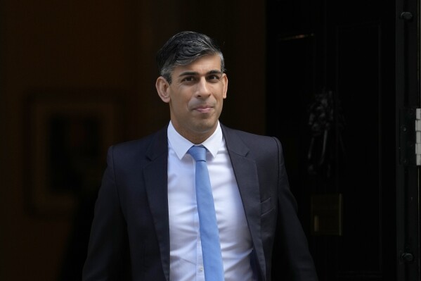 Britain's Prime Minster Rishi Sunak departs 10 Downing Street to go to the House of Commons for his weekly Prime Minister's Questions in London, Wednesday, April 17, 2024. (AP Photo/Alastair Grant)