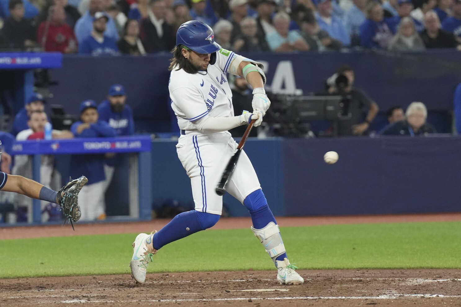 American League's Bo Bichette, of the Toronto Blue Jays, walks back to the  dugout during the MLB All-Star baseball game against the National League in  Seattle, Tuesday, July 11, 2023. (AP Photo/Lindsey