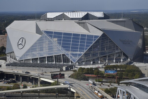 FILE - Mercedes-Benz stadium is seen, Wednesday, Oct. 4, 2017, in Atlanta. Mercedes-Benz Stadium in Atlanta will host the opening game and South Florida's Hard Rock Stadium gets the final when Copa América returns to the United States in 2024. A joint announcement was made Monday, Nov. 20, 2023, by CONMEBOL and CONCACAF, the governing bodies of South American and North American soccer, respectively. Other sites and scheduling for the 16-team tournament will be revealed later.(AP Photo/Mike Stewart, File)