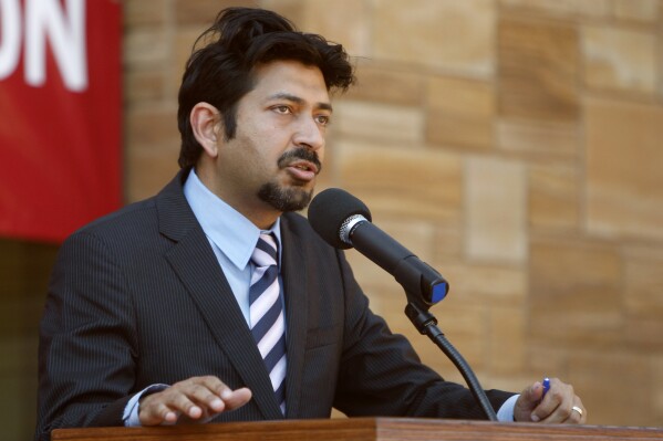 FILE - Physician Siddhartha Mukherjee speaks in Oklahoma City, Thursday, June 30, 2011. Physician-writer Siddhartha Mukherjee is in the running for Britain's leading nonfiction book award, The Baillie Gifford Prize, with “The Song of the Cell.” Books about the perilous state of our world, our food and our relationship with technology are among 13 books in the running for the prize. (AP Photo/Sue Ogrocki, File)