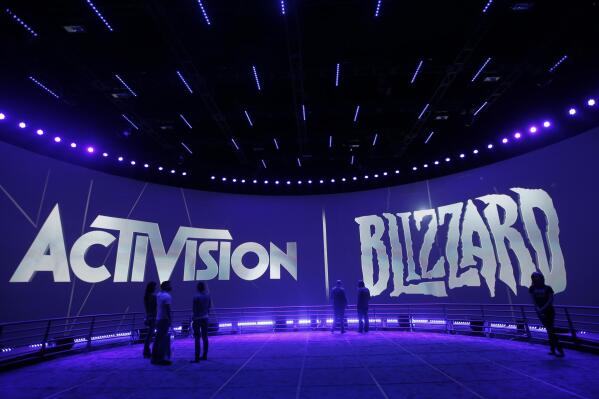 FILE - This June 13, 2013 file photo shows the Activision Blizzard Booth during the Electronic Entertainment Expo in Los Angeles. Activision Blizzard, one of the world’s most high-profile video game companies, confirmed an SEC probe and said it is working to address complaints of workplace discrimination. The Santa Monica, California, company said Tuesday, Sept. 21, 2021,  that it is complying with a recent Securities and Exchange Commission subpoena sent to current and former employees and executives and the company itself on “employment matters and related issues.”  (AP Photo/Jae C. Hong, File)