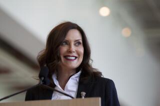 Gov. Gretchen Whitmer speaks at Steelcase in Grand Rapids, Mich., on Monday, May 24, 2021. It was the first day Steelcase is having many of their employees back in the office since the coronavirus pandemic started, thanks to the new MIOSHA rules that changed today, allowing non-essential workers to come back to offices. (Cory Morse/The Grand Rapids Press via AP)