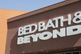 FILE - In this May 9, 2012 file photo, a Bed Bath & Beyond sign is shown in Mountain View, Calif. The investment firm of billionaire Ryan Cohen has taken a large stake in Bed Bath & Beyond and is recommending that the struggling retailer sell all or part of its business. (AP Photo/Paul Sakuma, File)