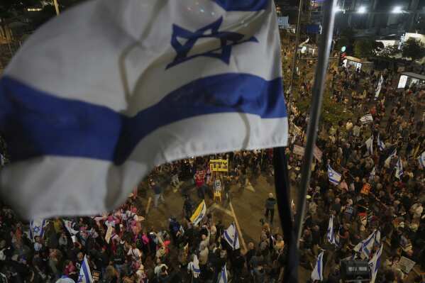 People take part in a protest demanding the end of the war and immediate release of hostages held by Hamas in the Gaza Strip, and against Prime Minister Benjamin Netanyahu's government in Tel Aviv, Israel, Saturday, May 3, 2025.(AP Photo/Ariel Schalit)