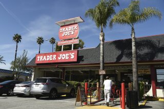 FILE - In this Feb. 26, 2020, file photo, the original Trader Joe's grocery store in Pasadena, Calif., is viewed. Responding to calls for Trader Joe's to stop labeling its international food products with ethnic-sounding names, the grocery store chain said it has been in a yearslong process of repackaging those products and will soon complete the work. (AP Photo/Chris Pizzello, File)