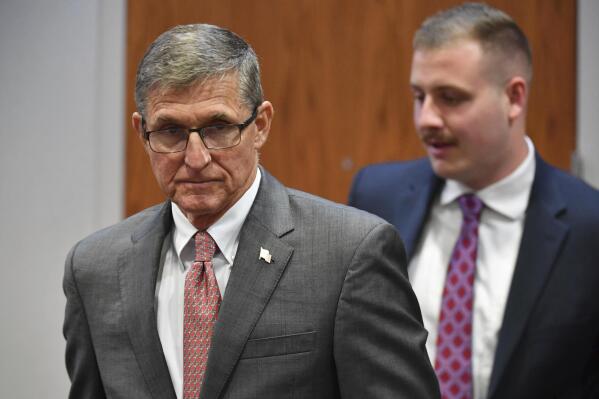 Former National Security Advisor to President Trump, Michael Flynn, appeared in court Tuesday, Nov. 15, 2022, to try to quash an order to appear before a Georgia special purpose grand jury investigating attempts to overturn the 2020 Presidential election. Sarasota County Chief Judge Charles Roberts ordered Flynn to testify before the panel on  Nov. 22. (Mike Lang/Sarasota Herald-Tribune via AP, Pool)
