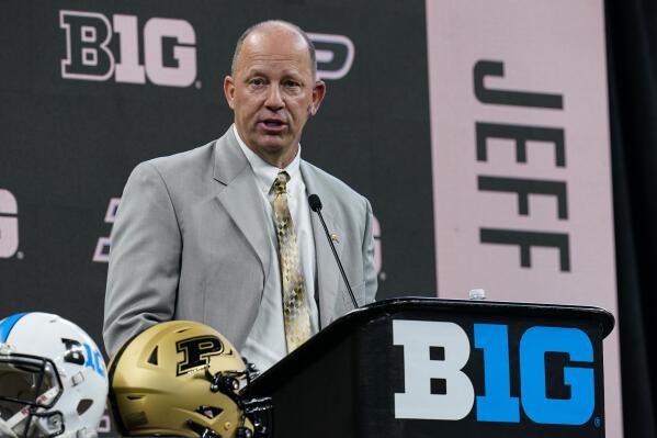 FILE - Purdue head coach Jeff Brohm talks to reporters during an NCAA college football news conference at the Big Ten Conference media days in Indianapolis, in this Friday, July 23, 2021, file photo. Brohm named Jack Plummer the starting quarterback late last week, partially because of his mobility. But Brohm also made it clear he's still willing to make a change -- if he doesn't get the kind of play he expects.  (AP Photo/Michael Conroy, File)