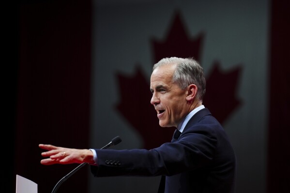 Canadian Prime Minister Mark Carney addresses supporters at Liberal campaign headquarters in Ottawa, Tuesday, April 29, 2025. (Sean Kilpatrick/The Canadian Press via AP)