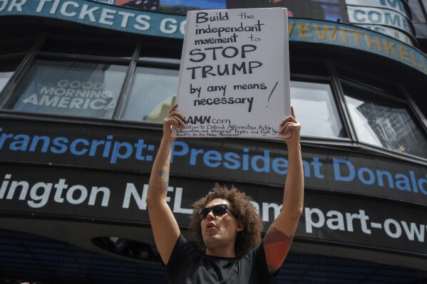 A protester shouts slogans during a protest against U.S. strikes in Iran, on Sunday, June 22, 2025, in New York. (AP Photo/Olga Fedorova)