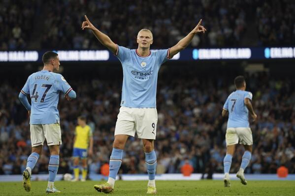 Manchester City's Erling Haaland, centre, celebrates after scoring his side's third goal during the English Premier League soccer match between Manchester City and Nottingham Forest at Etihad Stadium in Manchester, England, Wednesday, Aug 31, 2022. (AP Photo/Dave Thompson)
