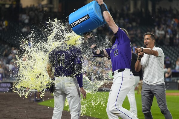 Muñoz strikes out seven over six innings to get 1st major league win, Marlins beat Rockies 4