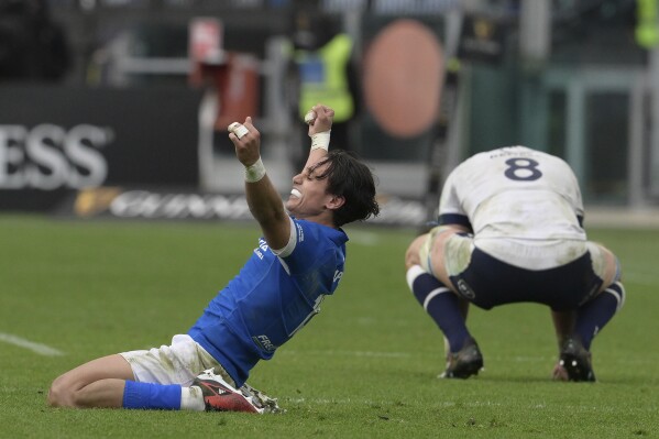 Italy's Ange Capuozzo celebrates at the end of the Six Nations rugby union match between Italy and Scotland at Rome's Olympic stadium, Saturday, March 9, 2024. Italy won 31-29. (Alfredo Falcone/LaPresse via AP)