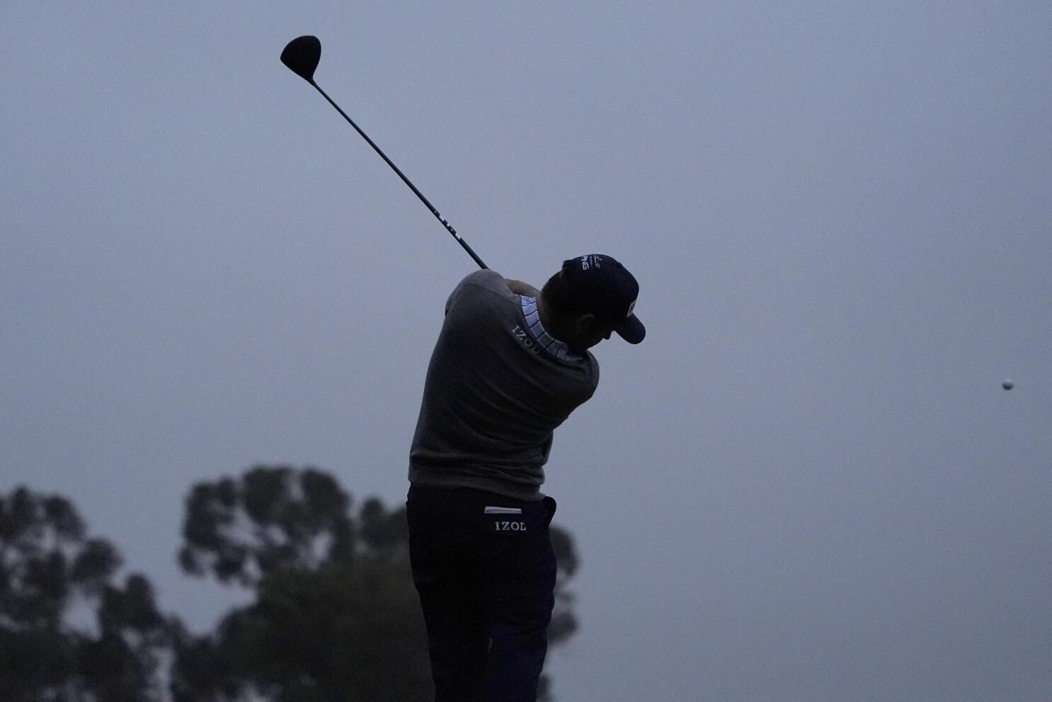 The Latest: First round of U.S. Open suspended by darkness | AP News