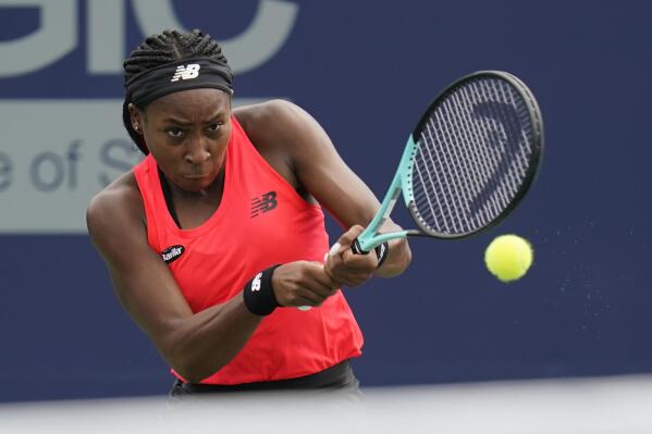 Coco Gauff returns to Robin Montgomery at the San Diego Open tennis tournament Wednesday, Oct. 12, 2022, in San Diego. (AP Photo/Gregory Bull)