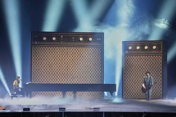 Lucio Corsi from Italy performs the song "Volevo Essere Un Duro" during the first semi-final of the 69th Eurovision Song Contest, in Basel, Switzerland, Tuesday, May 13, 2025. (AP Photo/Martin Meissner)