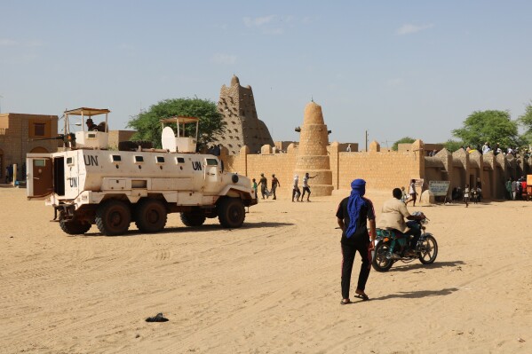 FILE - United Nation forces patrol the streets of Timbuktu, Mali, Sunday, Sept. 26, 2021. Mali’s military regime is struggling to fight growing violence in the West African nation's hard-hit northern region. That's after a peace deal signed several years ago with rebels appeared to have collapsed and as the United Nations peacekeepers who helped fight jihadi groups begin to leave. Attacks in northern Mali have more than doubled since U.N. peacekeepers completed the first phase of their withdrawal in Aug. 2023, after a decade of fighting Islamic extremists, resulting in more than 150 deaths. (AP Photo/Moulaye Sayah, File)