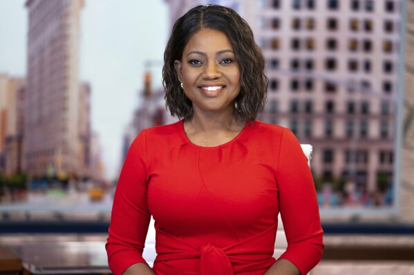 This undated photo, provided by Charter Communications Spectrum NY1, shows Ruschell Boone, an award-winning reporter and anchor for New York City TV station NY1, Boone, 48, has died after battling pancreatic cancer over the past year, the station announced Tuesday, Sept. 5, 2023. (Charter Communications Spectrum NY1 via AP)