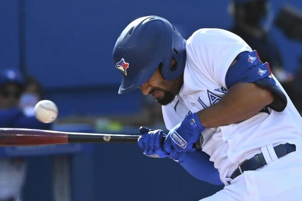Toronto Blue Jays' Marcus Semien ducks away from an inside pitch in the fourth inning of a baseball game against the Minnesota Twins in Toronto on Saturday, Sept. 18, 2021. (Jon Blacker/The Canadian Press via AP)