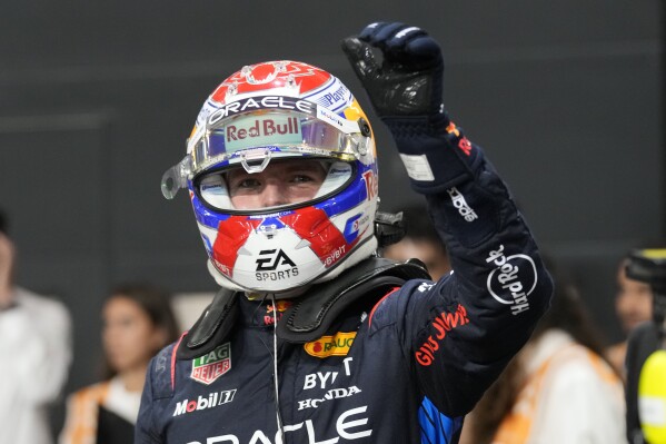 Red Bull driver Max Verstappen of the Netherlands celebrates after setting the pole position in the qualifying session ahead of the Formula One Saudi Arabian Grand Prix at the Jeddah Corniche Circuit in Jeddah, Saudi Arabia, Friday, March 8, 2024. Saudi Arabian Grand Prix will be held on Saturday, March 9, 2024. (AP Photo/Darko Bandic)