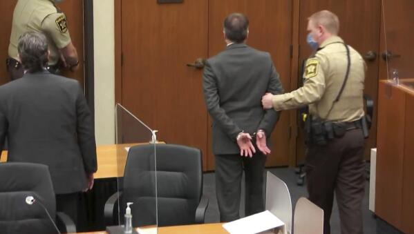 In this image from video, former Minneapolis police Officer Derek Chauvin, center, is taken into custody as his attorney, Eric Nelson, left, looks on, after the verdicts were read at Chauvin's trial for the 2020 death of George Floyd, Tuesday, April 20, 2021, at the Hennepin County Courthouse in Minneapolis, Minn. (Court TV via AP, Pool)