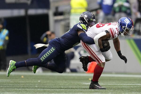 Giants can't overcome mistakes, Seattle's defense in loss