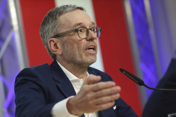 The leader of Austria's Freedom Party, Herbert Kickl, addresses a news conference, in Vienna, Austria, Tuesday, Jan 7, 2025. Herbert Kickl received a mandate Monday to try to form a new government. (AP Photo/Heinz-Peter Bader)