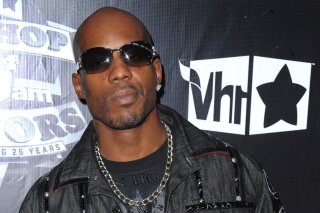 FILE - In this Sept. 23, 2009, file photo, DMX arrives at the 2009 VH1 Hip Hop Honors at the Brooklyn Academy of Music, in New York. The family of rapper DMX says he has died at age 50 after a career in which he delivered iconic hip-hop songs such as “Ruff Ryders’ Anthem." A statement from the family says the Grammy-nominated rapper died at a hospital in White Plains, New York, "with his family by his side after being placed on life support for the past few days. He was rushed to a New York hospital from his home April 2. (AP Photo/Peter Kramer, File)