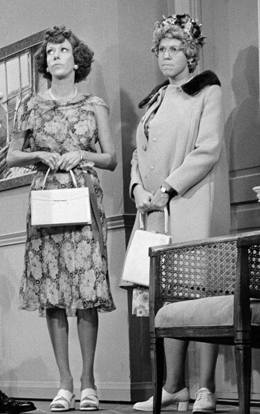 REMOVES REFERENCE TO HULU- FILE - Carol Burnett, left, and Vicki Lawrence, appear at the taping of the final "Carol Burnett Show" on March 17, 1978, in Los Angeles. Episodes of "The Carol Burnett Show" are available on streaming services like Tubi and The Roku Channel. (AP Photo/George Brich, File)