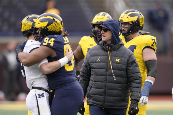 Michigan head coach Jim Harbaugh watches during during an NCAA college football intra-squad spring game, Saturday, April 1, 2023, in Ann Arbor, Mich. (AP Photo/Carlos Osorio)