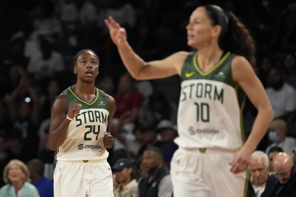 Seattle Storm guard Jewell Loyd (24) celebrates after making a 3-point shot against the Las Vegas Aces during the first half in Game 1 of a WNBA basketball semifinal playoff series Sunday, Aug. 28, 2022, in Las Vegas. (AP Photo/John Locher)