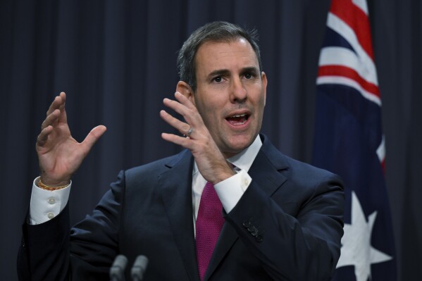 Australian Treasurer Jim Chalmers speaks to the media during a press conference at Parliament House in Canberra, Friday, Sept. 22, 2023. Australia’s government reported Friday that it had a budget surplus of 22.1 billion Australian dollars ($14.2 billion) in the last fiscal year, the first time the nation’s books have been balanced in 15 years. (Lukas Coch/AAP Image via AP)