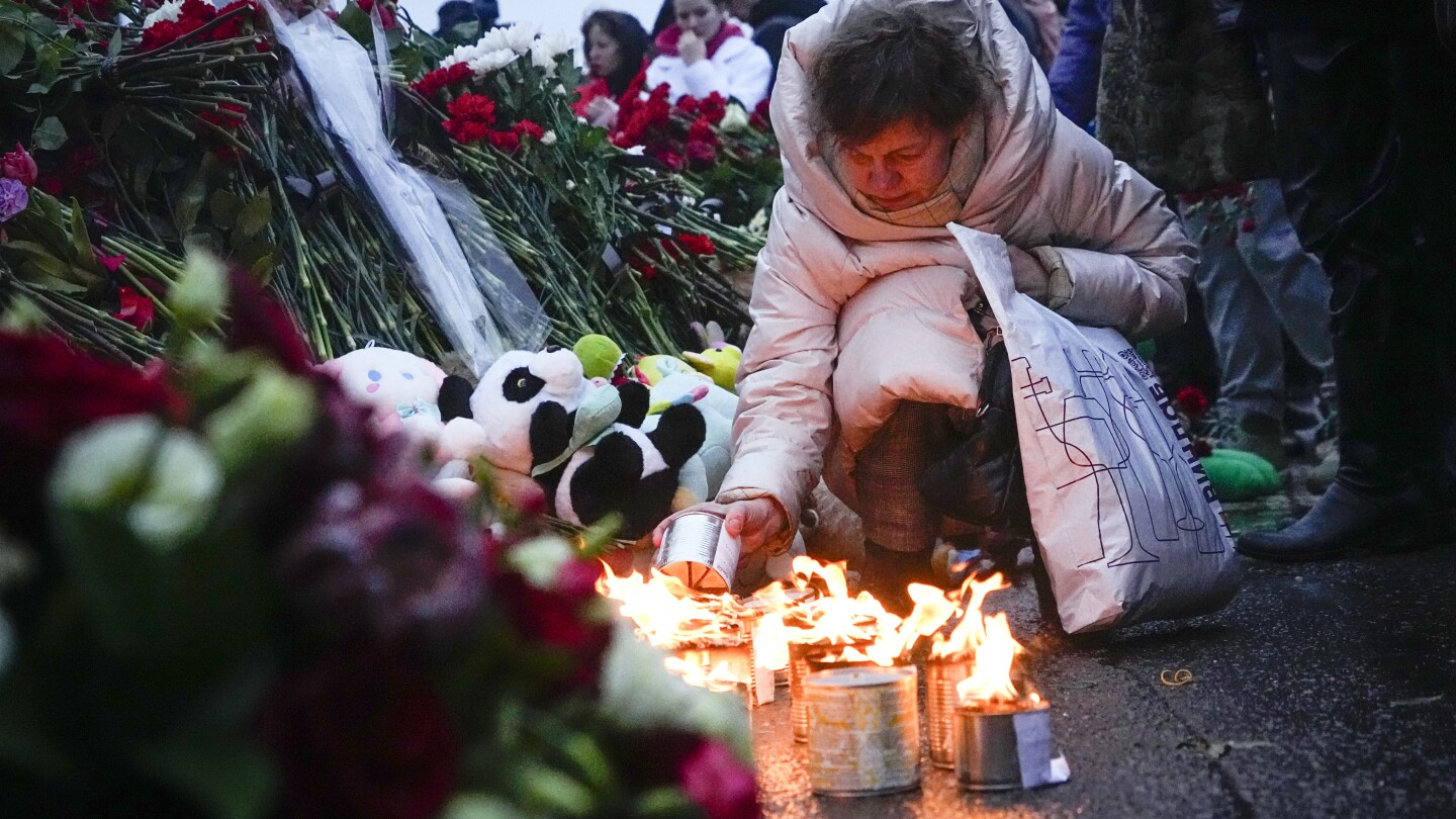 Шокирани руснаци донесоха цветя и плюшени мечета в събота в
