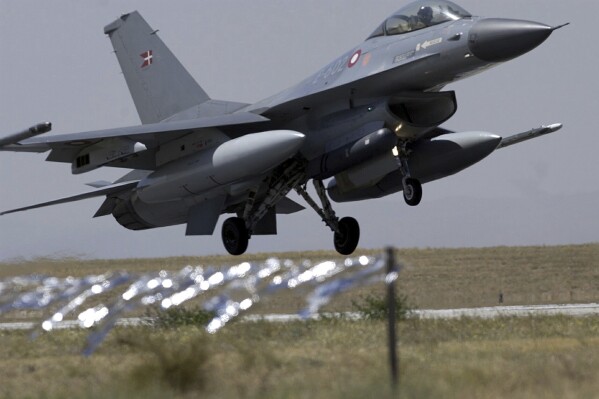 FILE - A Norwegian air force F-16 fighter lands at a Turkish air base in the Central Anatolian Turkish city of Konya on Wednesday, Sept. 8, 2004. NATO-member Norway will donate F-16 fighter jets to Ukraine whose forces are embroiled in a difficult counteroffensive against Russia, Norwegian broadcasters NRK and TV2 said Thursday, Aug. 24, 2023. (AP Photo/Burhan Ozbilici, File)