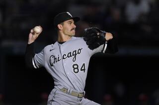 Dylan Cease, abridor de los Medias Blancas de Chicago, hace un lanzamiento en el juego del viernes 5 de agosto de 2022, ante los Rangers de Texas (AP Foto/Tony Gutiérrez)