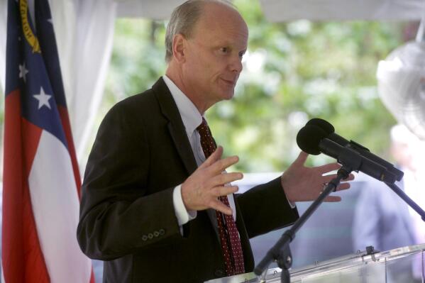 FILE - In this Aug. 29, 2017, file photo, Steve Wrigley, chancellor of the University System of Georgia, speaks at the groundbreaking of the Waters College of Health Profession at Armstrong State University in Savannah, Ga. Wrigley announced Tuesday, Jan. 12, 2020, that he will retire on July 1. (Steve Bisson/Savannah Morning News via AP, File)