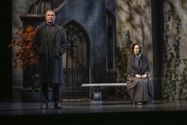 This image released by Polk & Co. shows Liev Schreiber as Father Flynn, left, and Zoe Kazan as Sister James, in Roundabout Theatre Company's new Broadway production of 