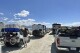FILE - Vehicles line up in a several hour wait to leave the Burning Man festival in Black Rock Desert, Nev., Tuesday, Sept. 5, 2023. On Friday, Sept. 8, The Associated Press reported on stories circulating online incorrectly claiming officials confirmed an Ebola outbreak at the Burning Man festival and that a national emergency was declared. (AP Photo/Andy Barron, File)