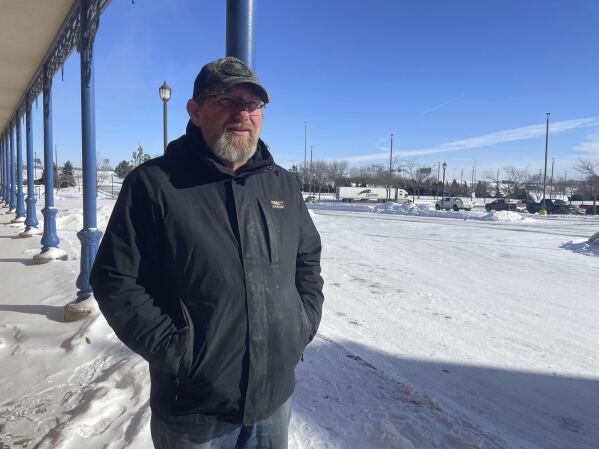 Hans Rudin, a community college adviser, appears in a photo on Sunday in Council Bluffs, Iowa. (AP Photo/Adriana Gomez Licon)