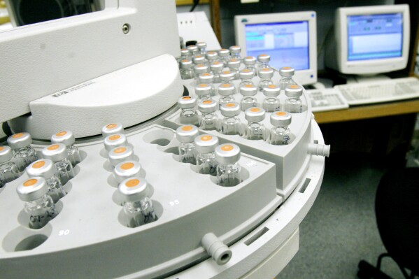 Evidence awaits testing in the toxicology lab at the state Crime Lab in Jackson, Miss., July 6, 2007. Incomplete homicide autopsy reports continued to pile up in Mississippi even as state leaders have touted tough-on-crime governance and a commitment to victims this year heading into the Nov. 7, 2024 general election. (AP Photo/Rogelio V. Solis)