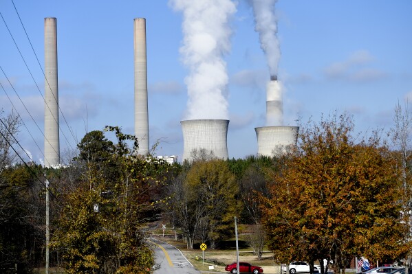 FILE - Plant Bowen, commonly known as Bowen Steam Plant, is a Coal power station, operating, Monday, Dec. 14, 2020, in Euharlee, Ga. The Georgia Public Service Commission approved a deal on Tuesday, April 16, 2024 that allows the company to contract for or build additional generation capacity. (AP Photo/Mike Stewart, File)